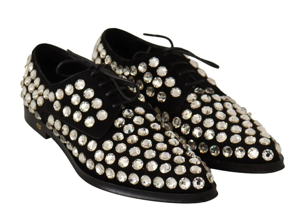 Black leather lace-up Oxford shoe adorned with large round crystals and a low heel.