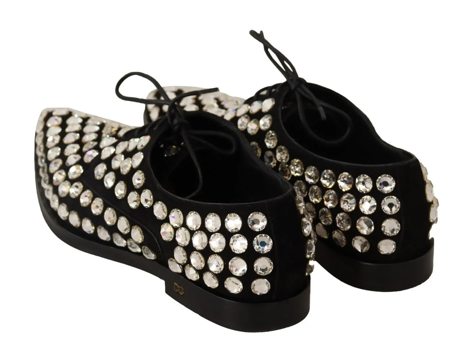 Black leather lace-up Oxford shoe adorned with large round crystals and a low heel.