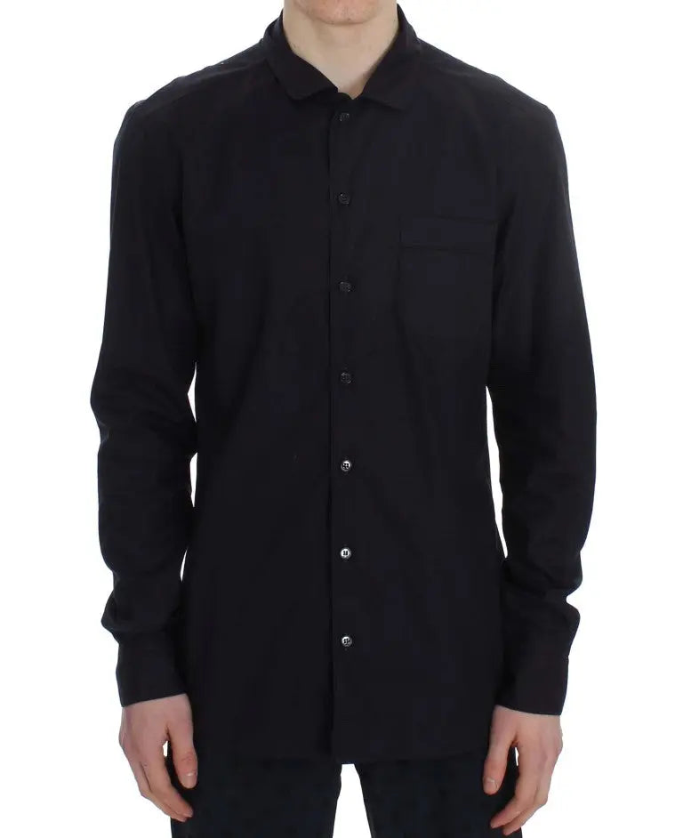 Black button-up long-sleeve cotton shirt with a chest pocket on the left side.