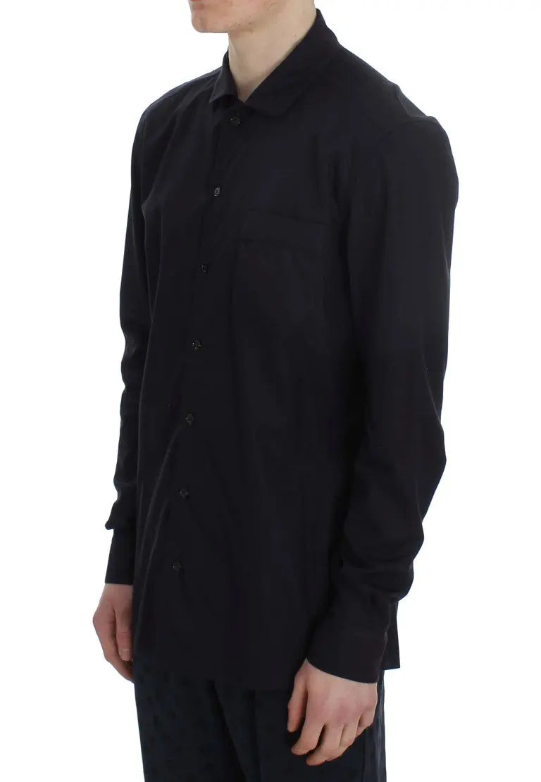 Black button-up long-sleeve cotton shirt with a chest pocket on the left side.