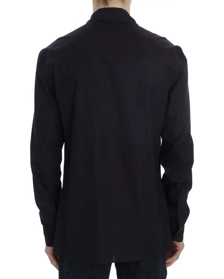 Black button-up long-sleeve cotton shirt with a chest pocket on the left side.