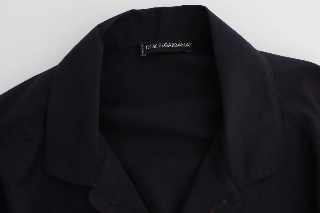 Black button-up long-sleeve cotton shirt with a chest pocket on the left side.