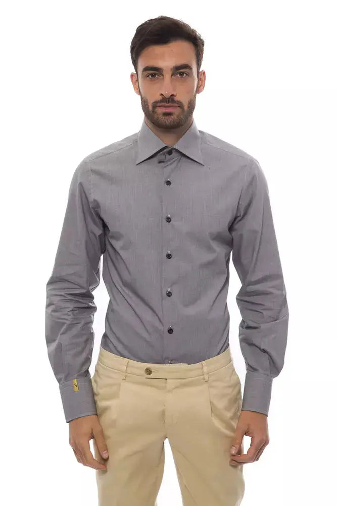Slim-fit black cotton men’s dress shirt with black buttons and a pointed collar.
