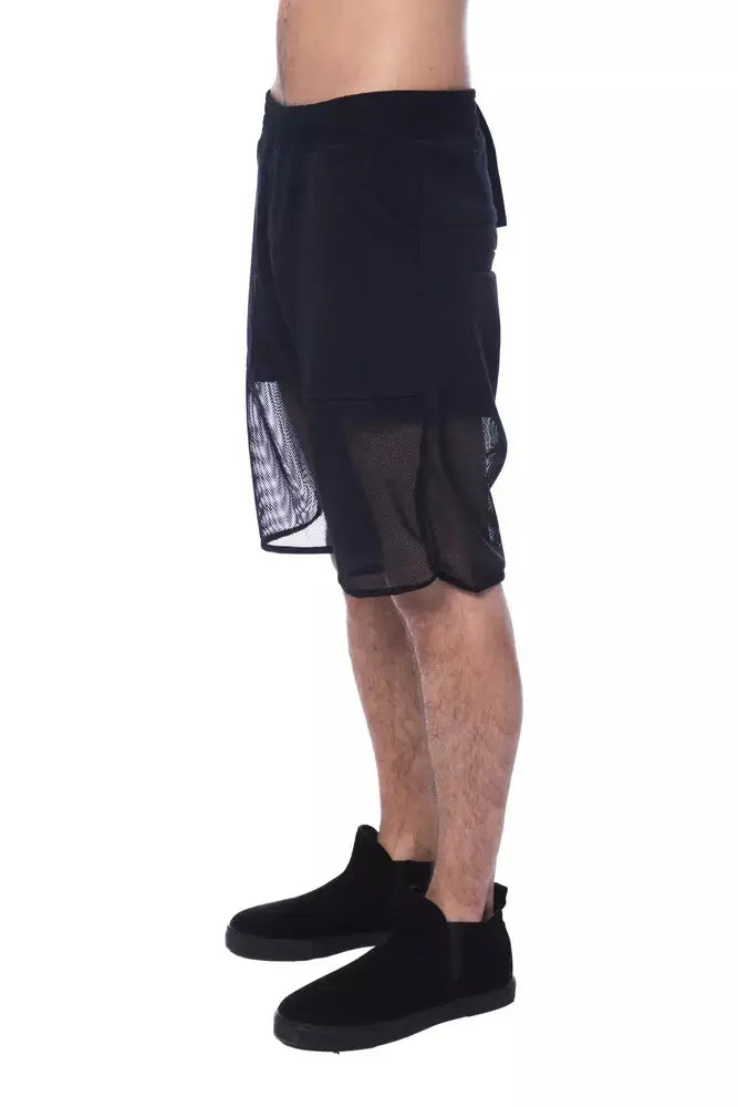 Black polyester men's sports shorts with mesh overlay and elastic waistband.