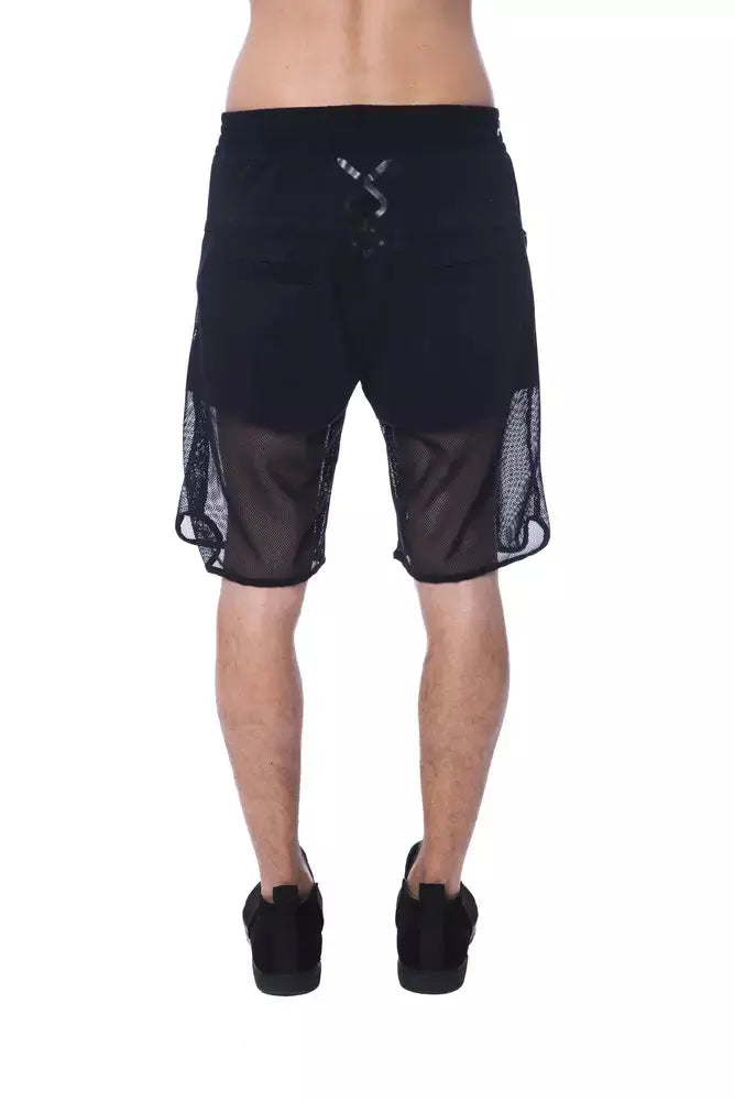 Black polyester men's sports shorts with mesh overlay and elastic waistband.