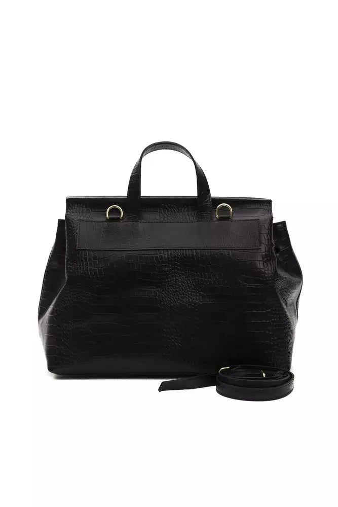 Black leather women’s shoulder bag with textured flap and silver rectangular plaque.