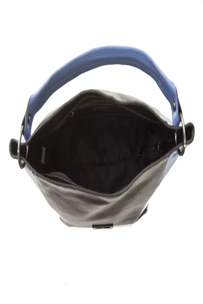 Black leather shoulder bag with navy side panels and top handle, gold-tone logo plaque.