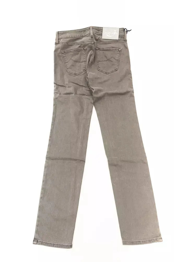Folded gray slim fit cotton jeans for women with back pocket and belt loops.