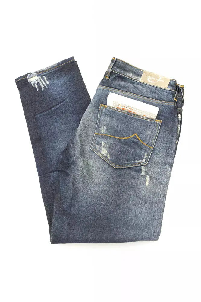 Folded blue cotton straight-leg jeans with faded wash and subtle distressing on knee and pocket areas.