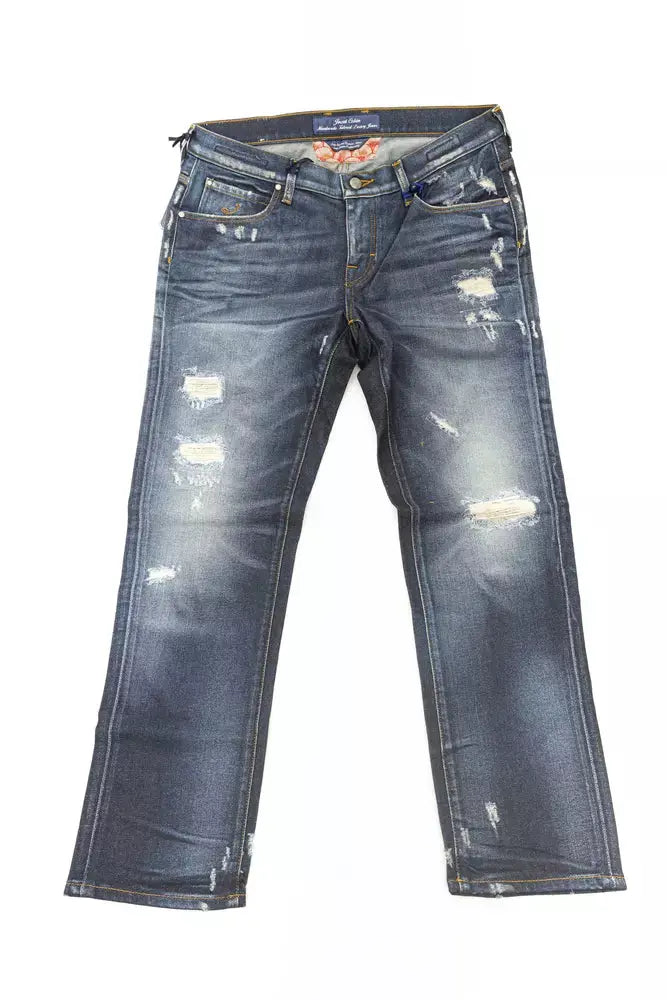 Folded blue cotton straight-leg jeans with faded wash and subtle distressing on knee and pocket areas.