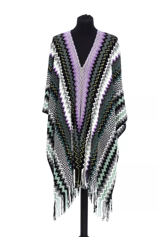 Multicolor wool poncho with chevron pattern in purple, black, green, white, and gray, featuring fringe hem.