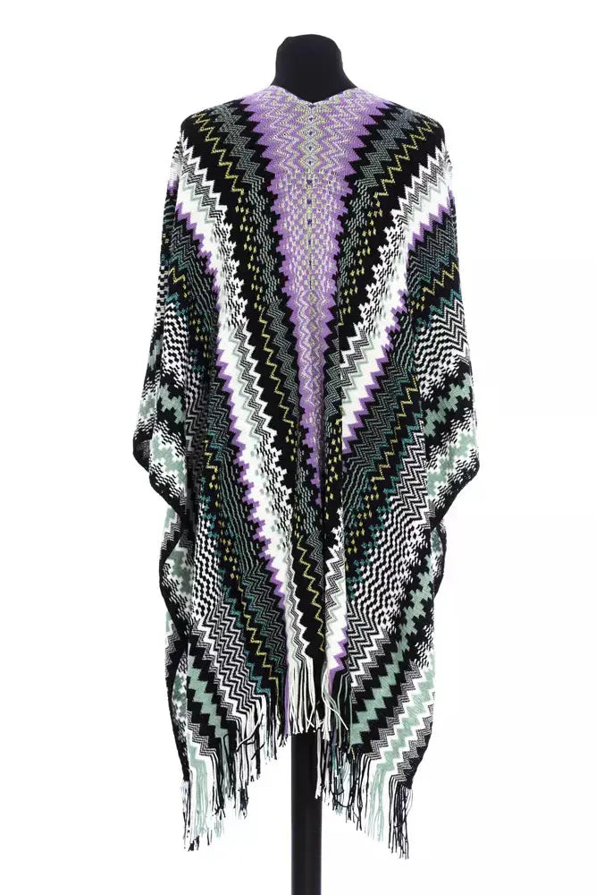 Multicolor wool poncho with chevron pattern in purple, black, green, white, and gray, featuring fringe hem.