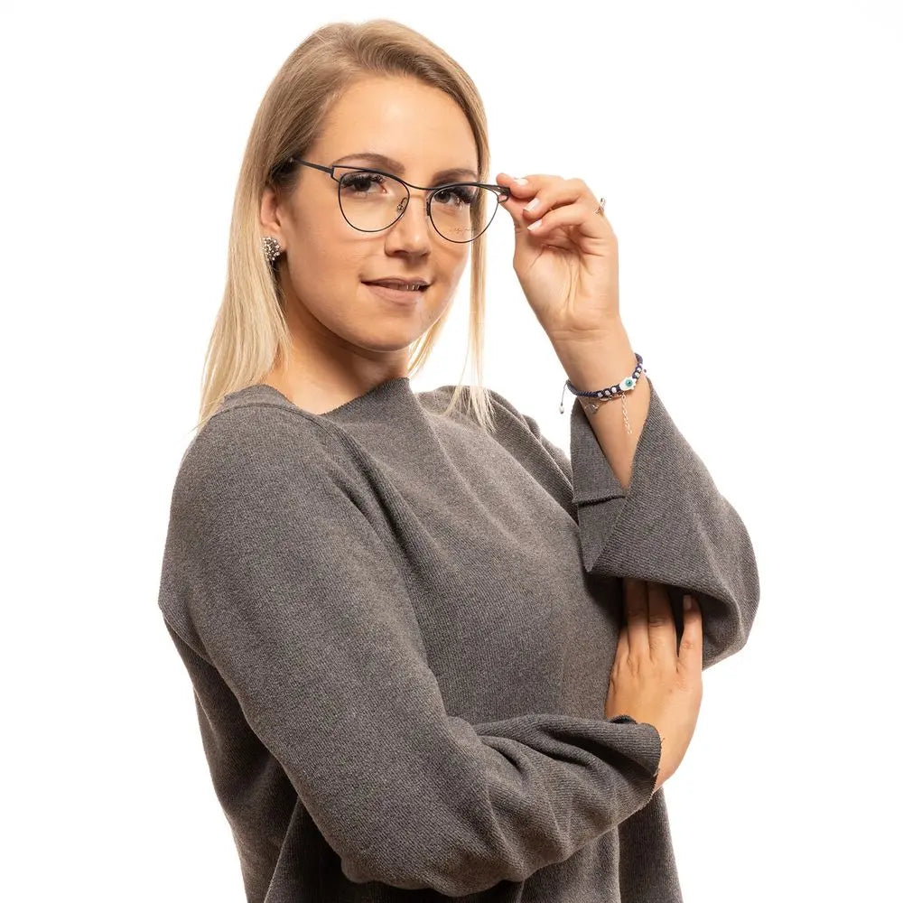 Slim green metal round eyeglass frames with thin temples and clear lenses.