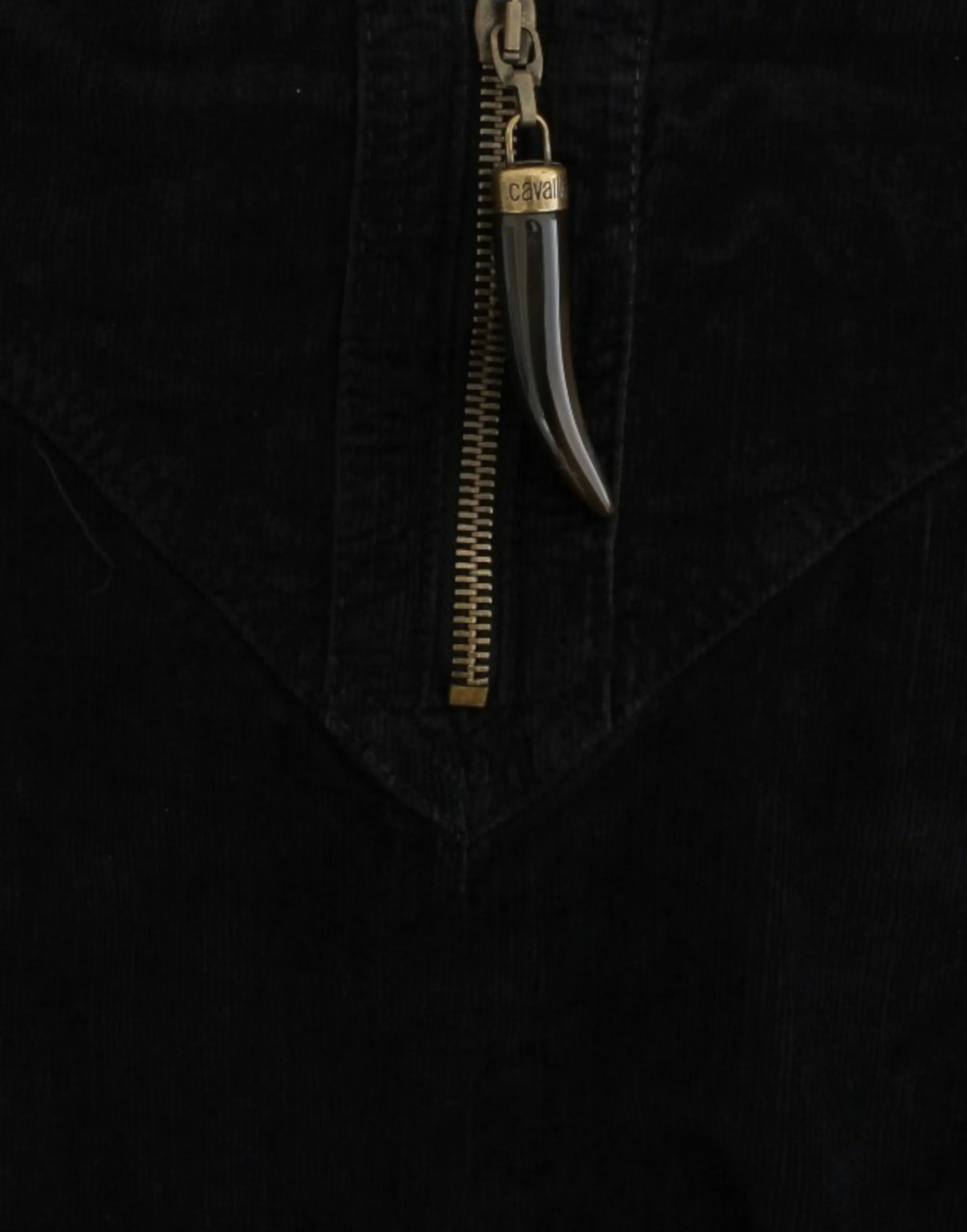 Black corduroy pencil skirt with front zipper and high waist, midi length.