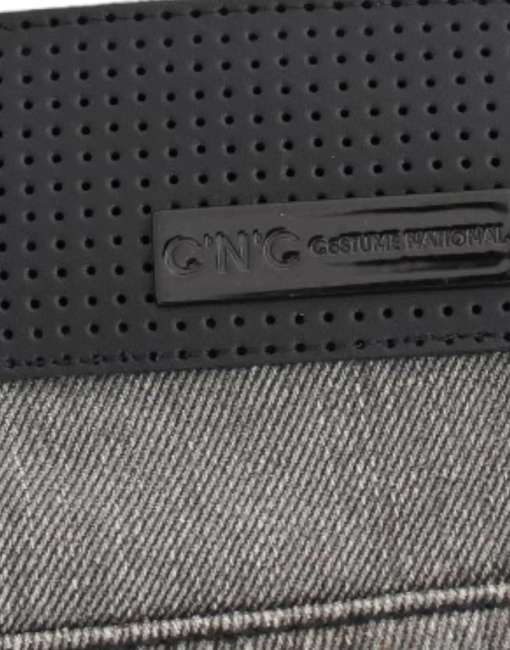 Gray straight-leg jeans with slight distressing on upper thighs and knees, mid-rise fit.