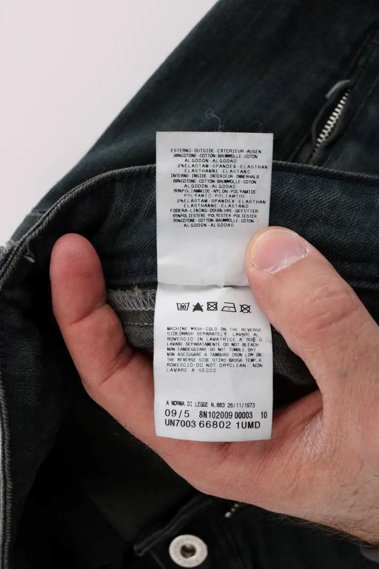 Gray superslim denim jeans in cotton-elastane blend with classic five-pocket design and button closure.