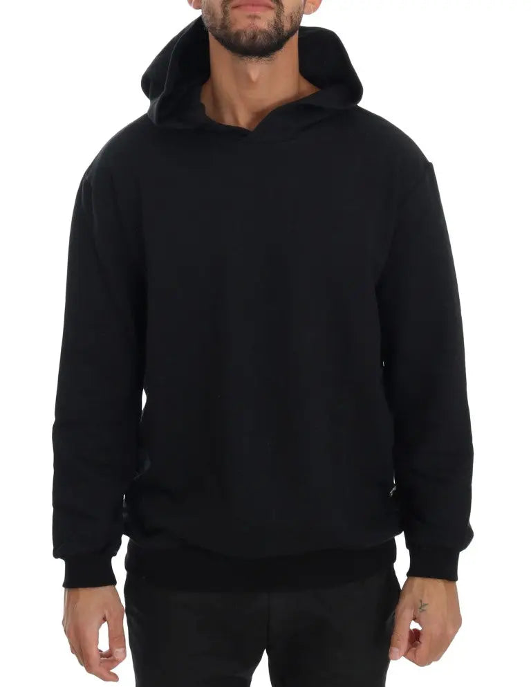 Black hooded casual cotton sweater with ribbed cuffs and hem, worn by male model.