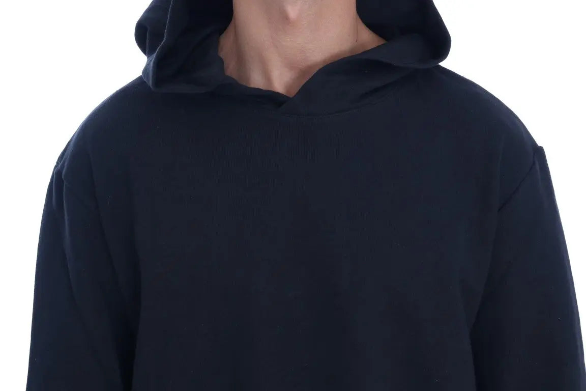 Black hooded casual cotton sweater with ribbed cuffs and hem, worn by male model.