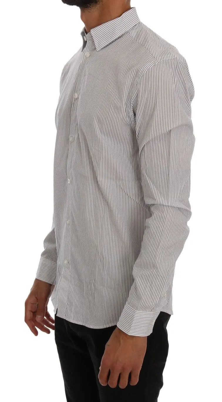 White cotton shirt with thin blue vertical stripes, button-down collar, and long sleeves.