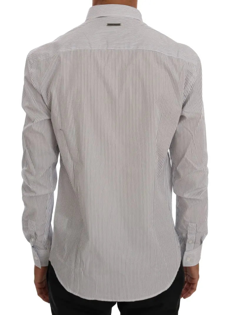 White cotton shirt with thin blue vertical stripes, button-down collar, and long sleeves.