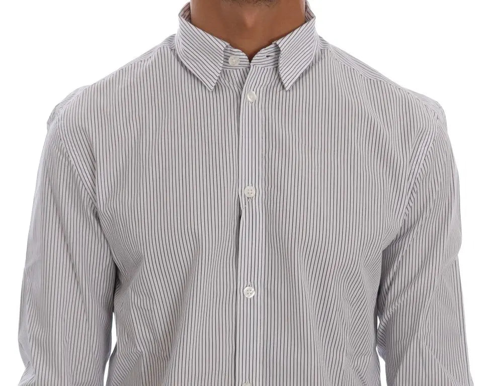 White cotton shirt with thin blue vertical stripes, button-down collar, and long sleeves.