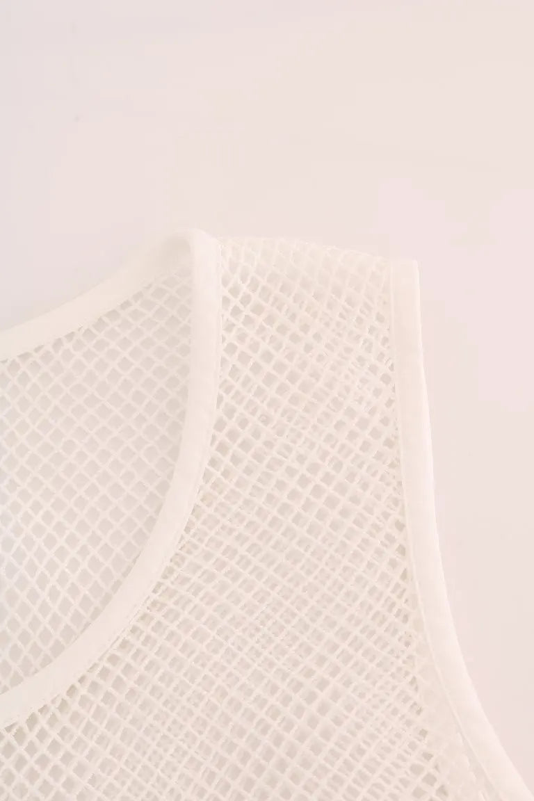 White sleeveless mesh tank top with scoop neck and relaxed fit.