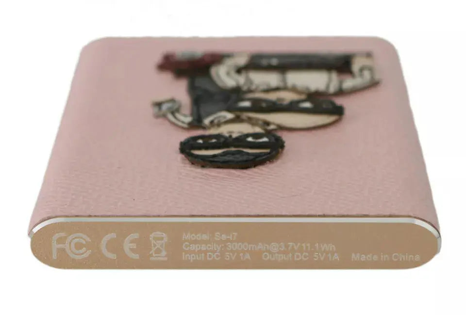 Pink leather power bank with cartoon man and woman wearing glasses holding phone and laptop design.
