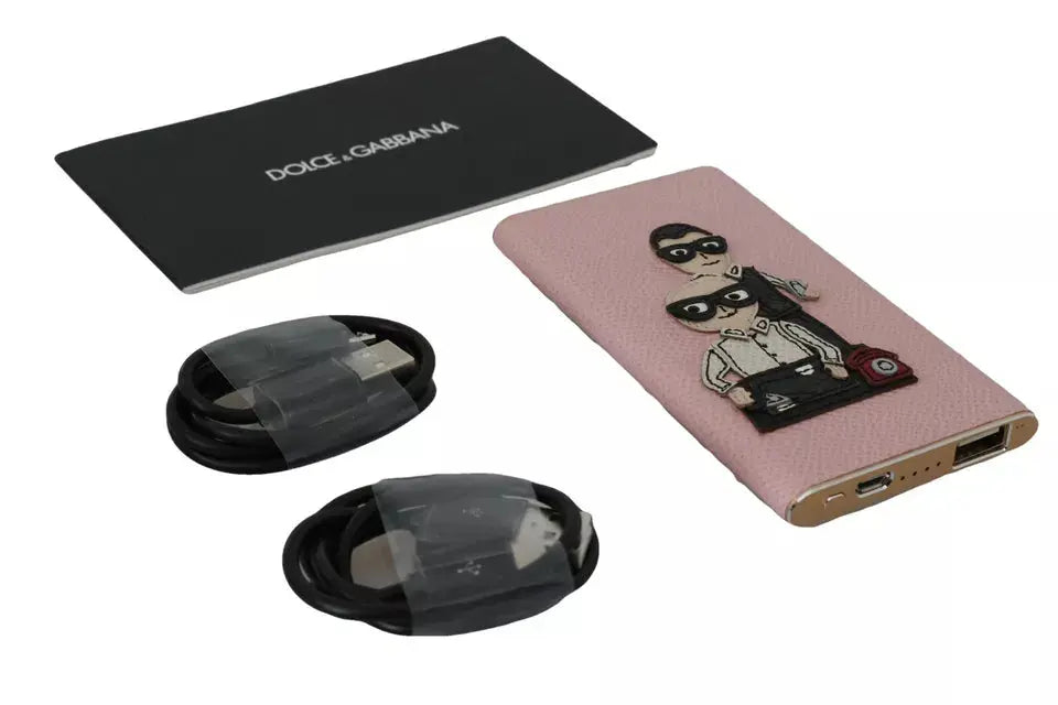 Pink leather power bank with cartoon man and woman wearing glasses holding phone and laptop design.