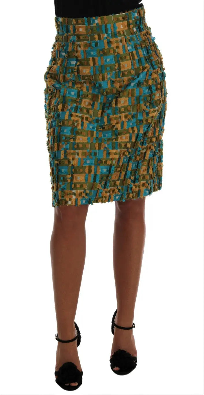 Multicolor jacquard midi pencil skirt with blue, gold, and black checkered pattern and high waist.