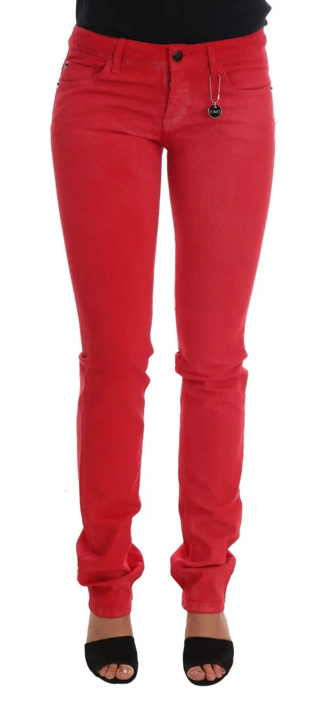Red slim fit women's jeans in stretch cotton with classic five-pocket design and zip fly closure.