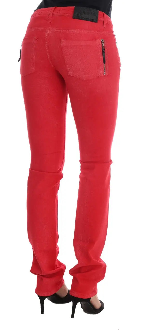 Red slim fit women's jeans in stretch cotton with classic five-pocket design and zip fly closure.