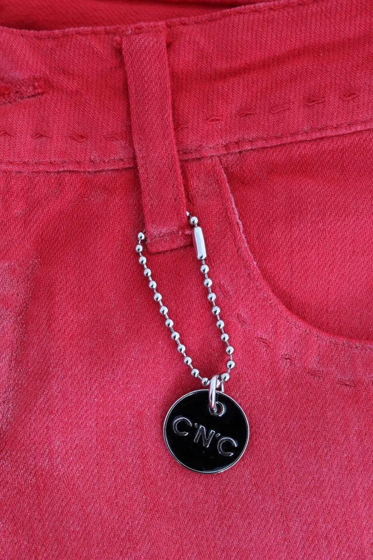 Red slim fit women's jeans in stretch cotton with classic five-pocket design and zip fly closure.