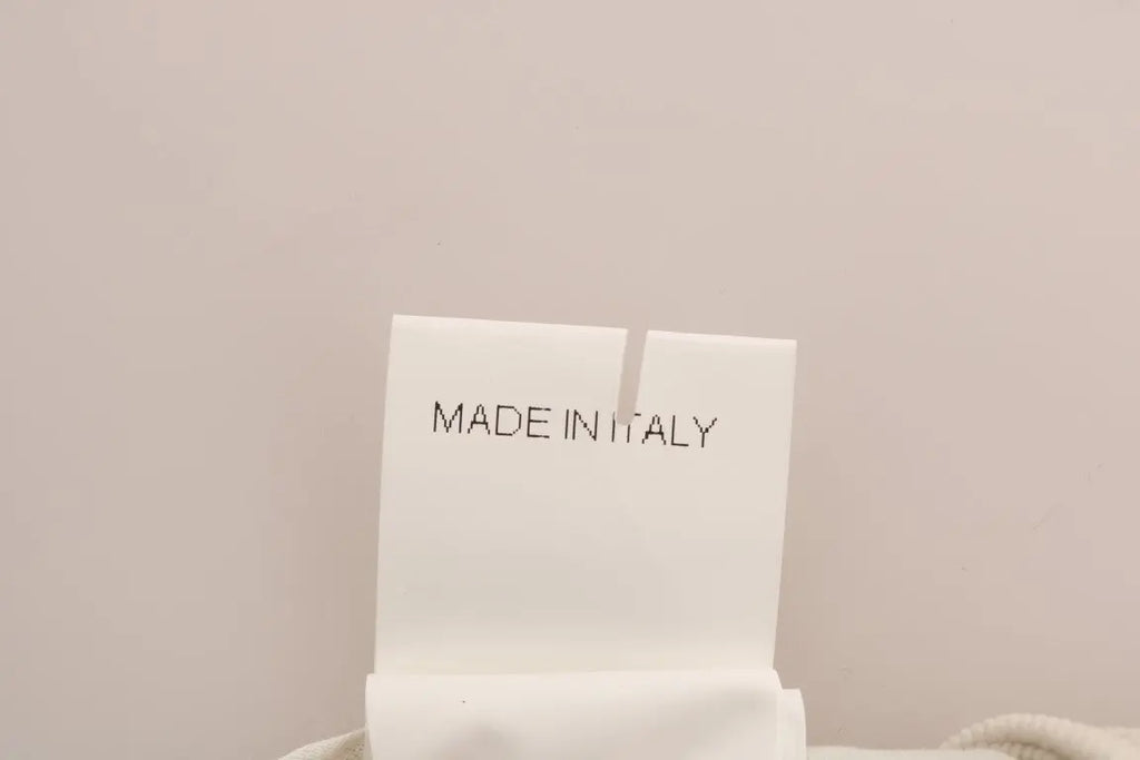 Beige slim-fit corduroy skinny pants with mid-rise waist and front pockets.