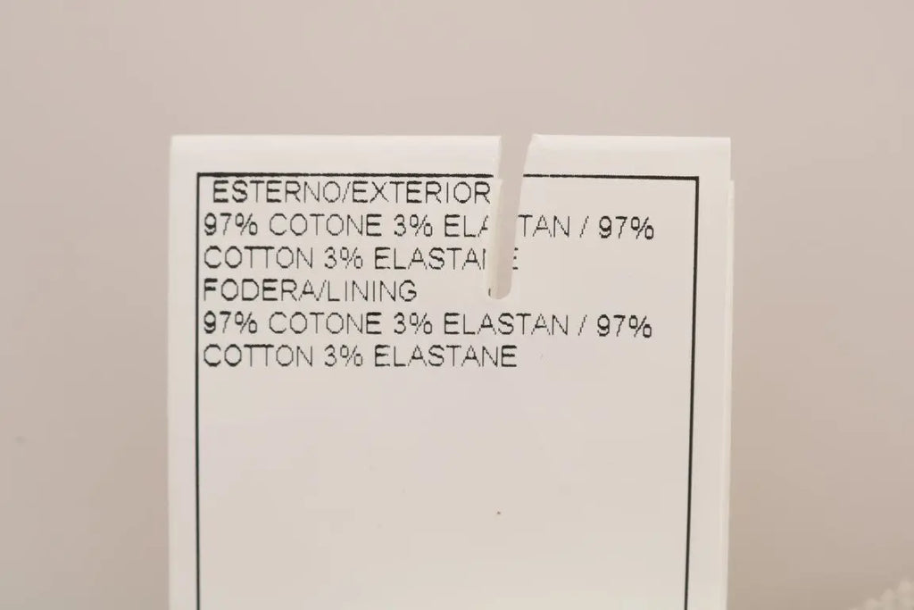 Beige slim-fit corduroy skinny pants with mid-rise waist and front pockets.