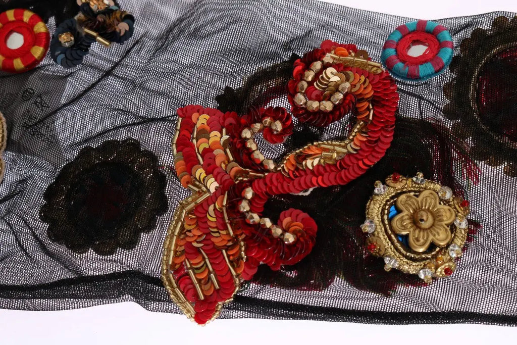 Black knee-high stretch socks with colorful crystal-embellished floral and paisley patterns.