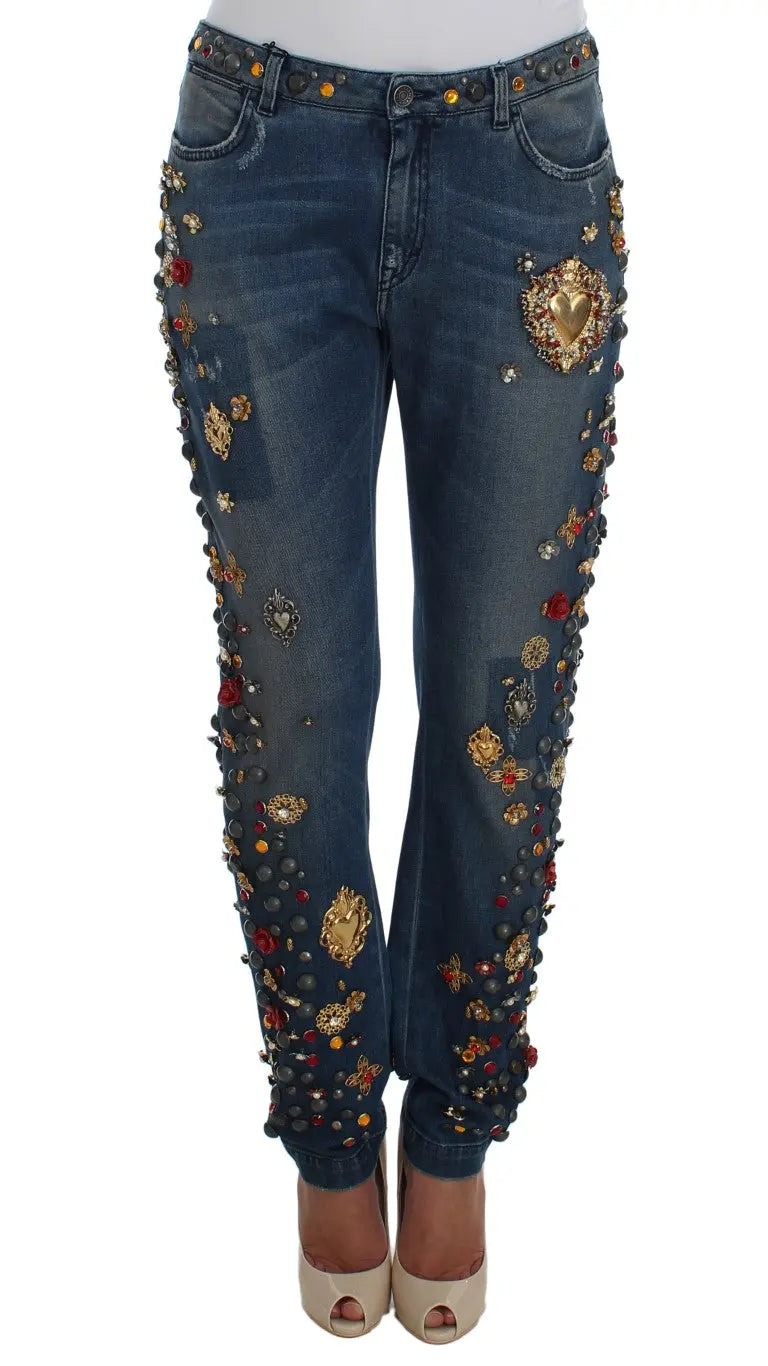 Dark blue boyfriend jeans with crystal rose and heart embellishments and rolled cuffs.