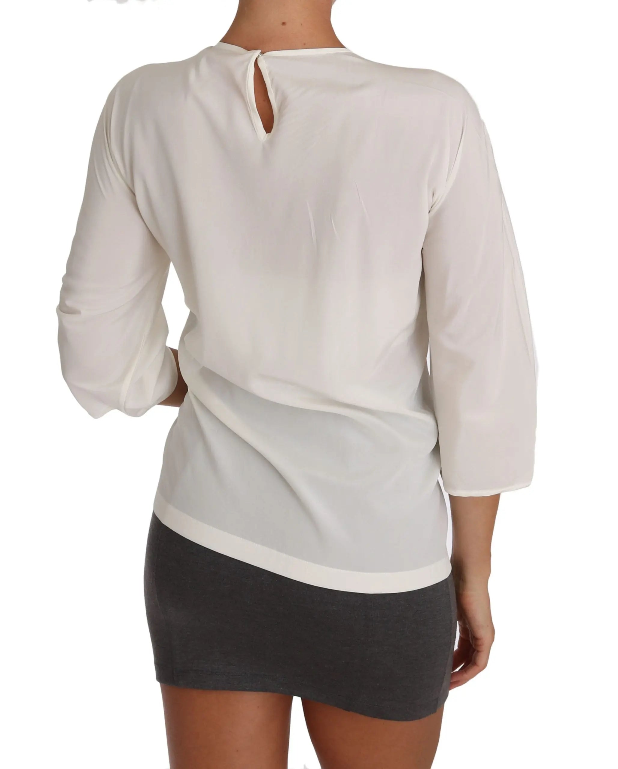 White silk blouse T-shirt with 3/4 sleeves and playful cartoon print on front.