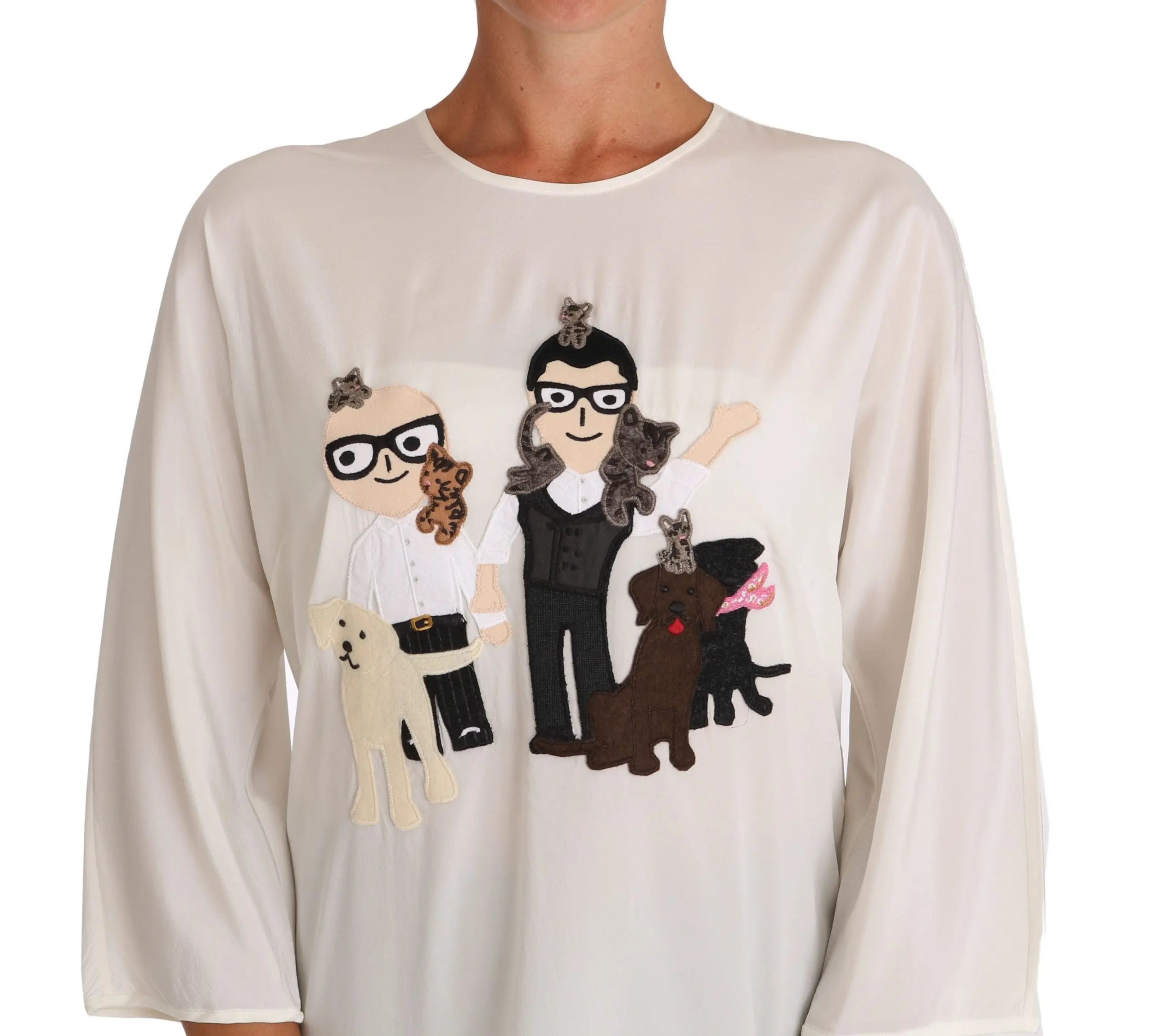 White silk blouse T-shirt with 3/4 sleeves and playful cartoon print on front.