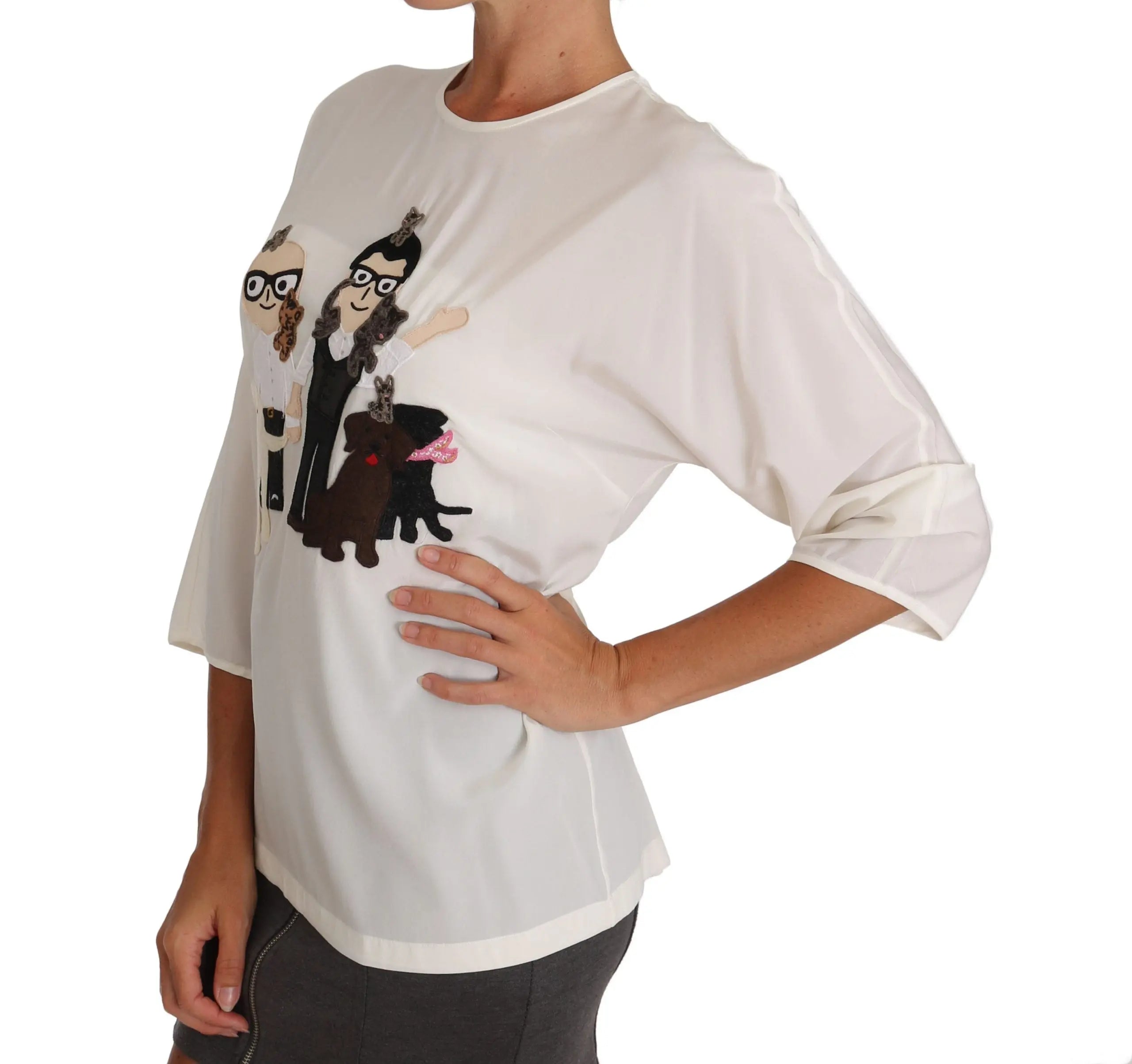 White silk blouse T-shirt with 3/4 sleeves and playful cartoon print on front.