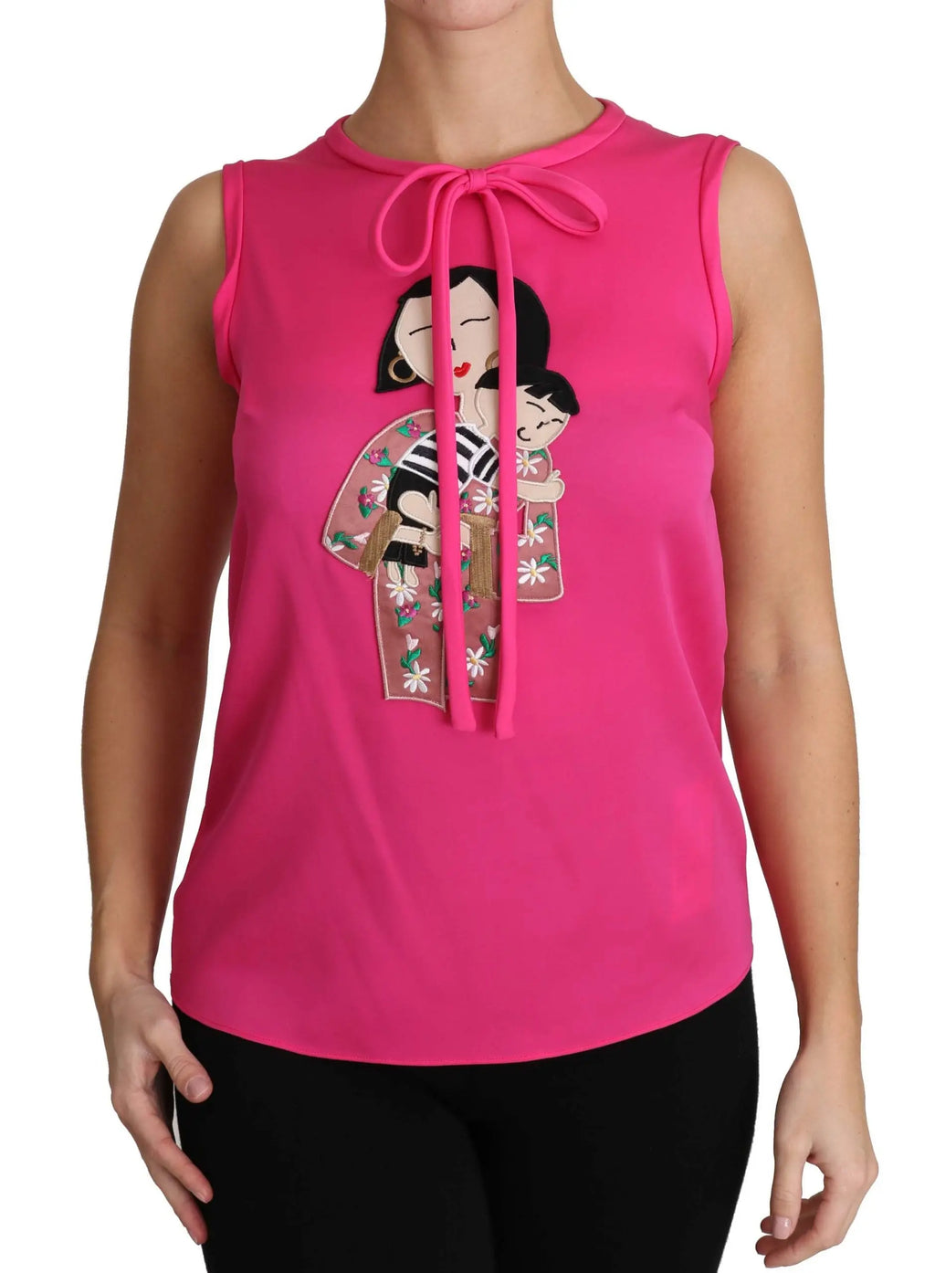 Pink sleeveless silk tank top with a bow tie neckline and colorful embroidered characters on the front.