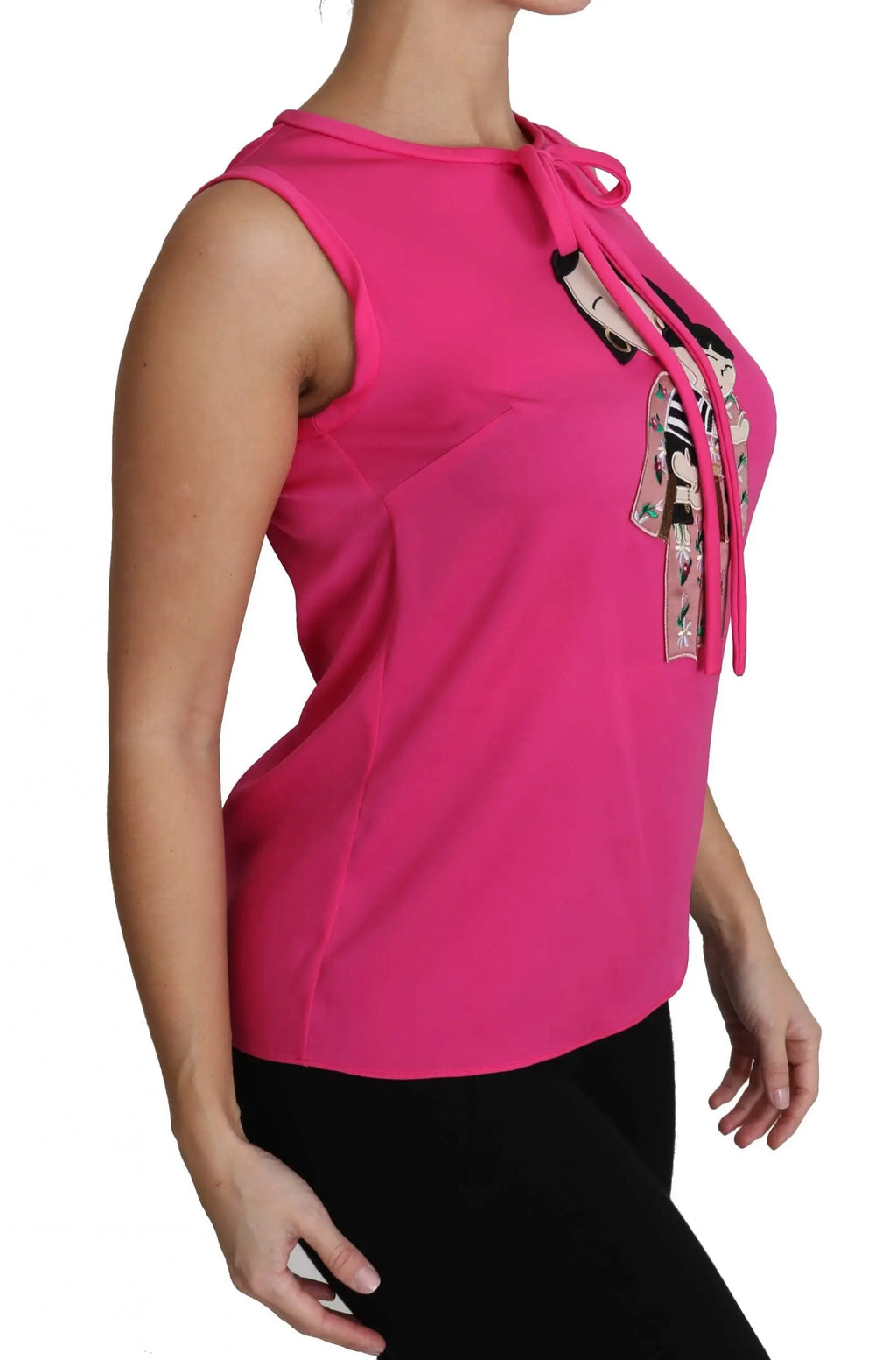 Pink sleeveless silk tank top with a bow tie neckline and colorful embroidered characters on the front.
