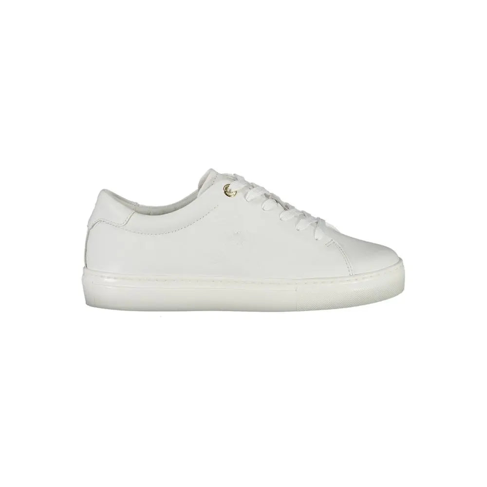 White low-top leather sneaker for women with white laces and rubber sole.