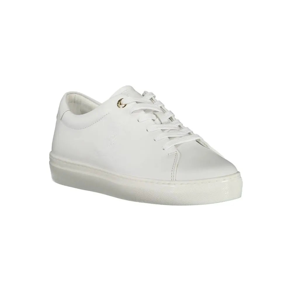 White low-top leather sneaker for women with white laces and rubber sole.