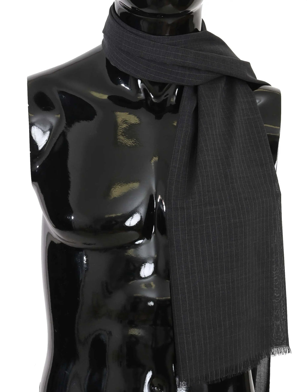 Gray wool scarf with subtle vertical stripe pattern and fringed ends wrapped around a black mannequin bust.