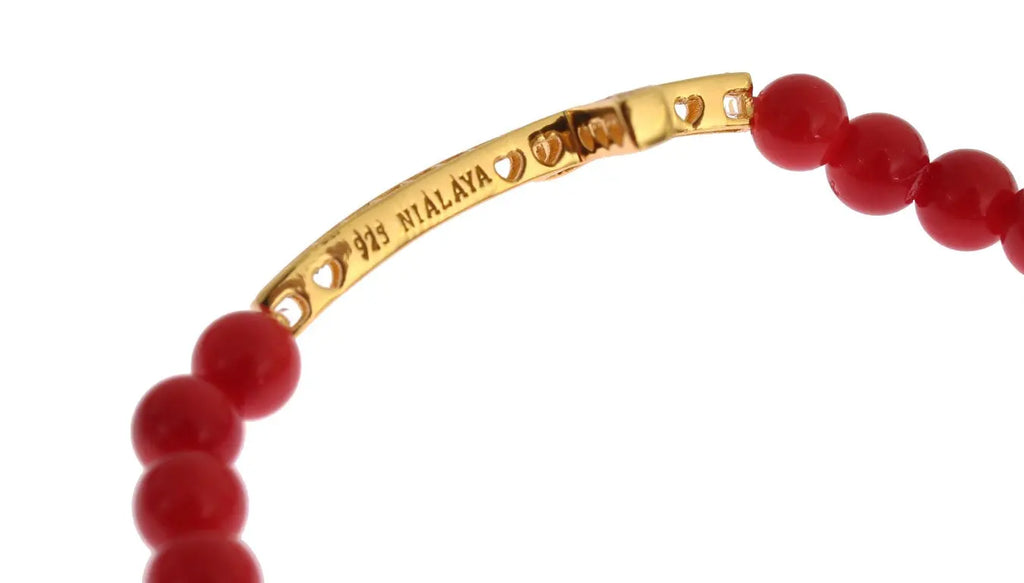 Red coral bead bracelet with gold-plated 925 silver CZ diamond cross charm and gold bead.