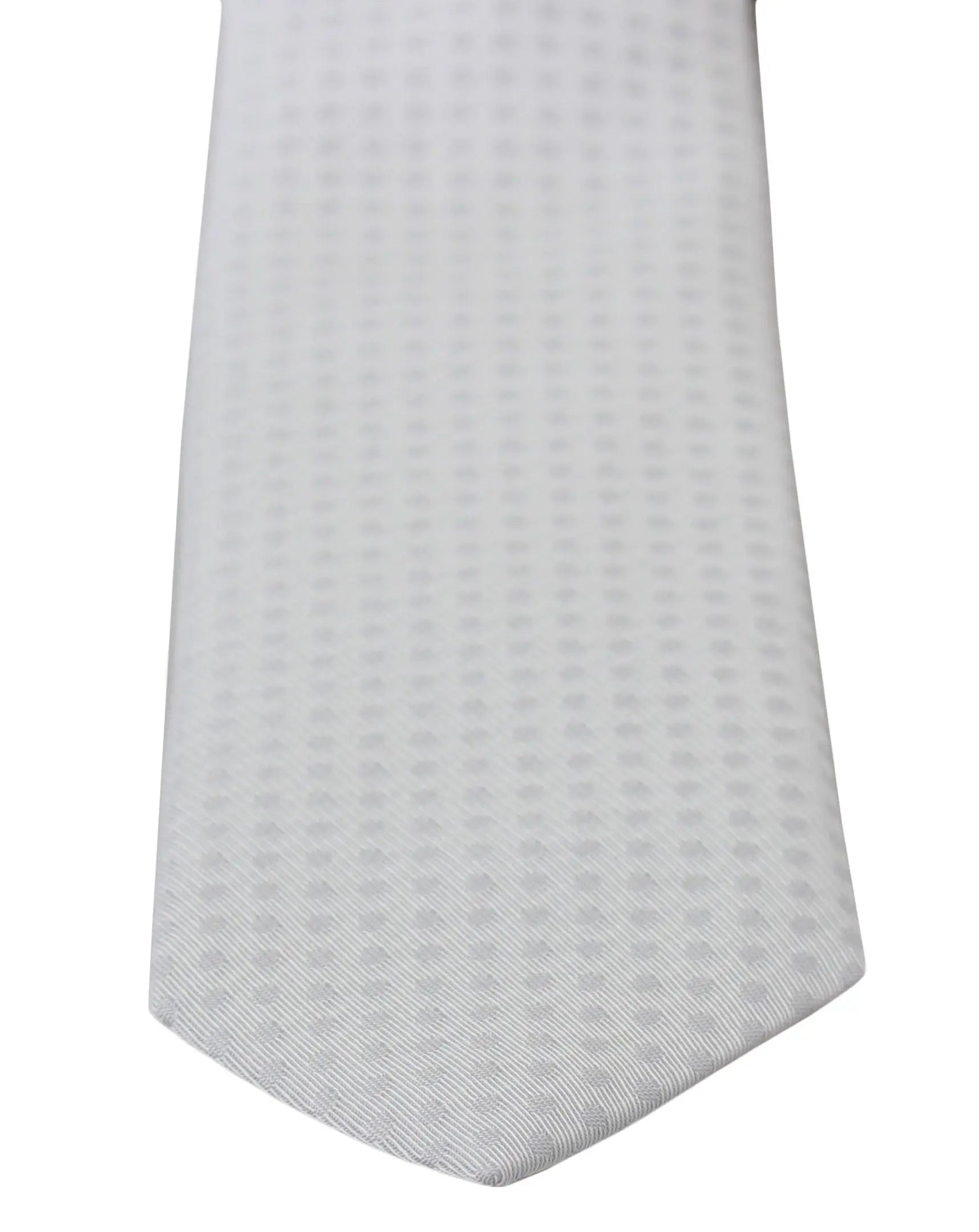 White slim necktie with subtle checkered pattern in nylon and silk blend.
