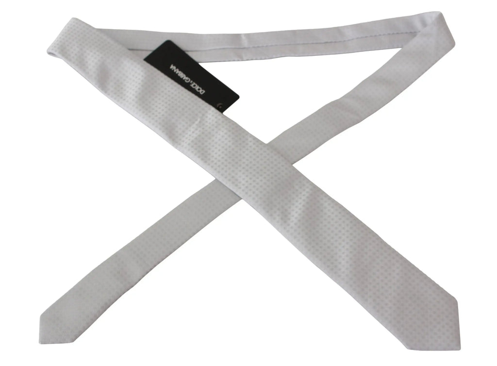 White slim necktie with subtle checkered pattern in nylon and silk blend.