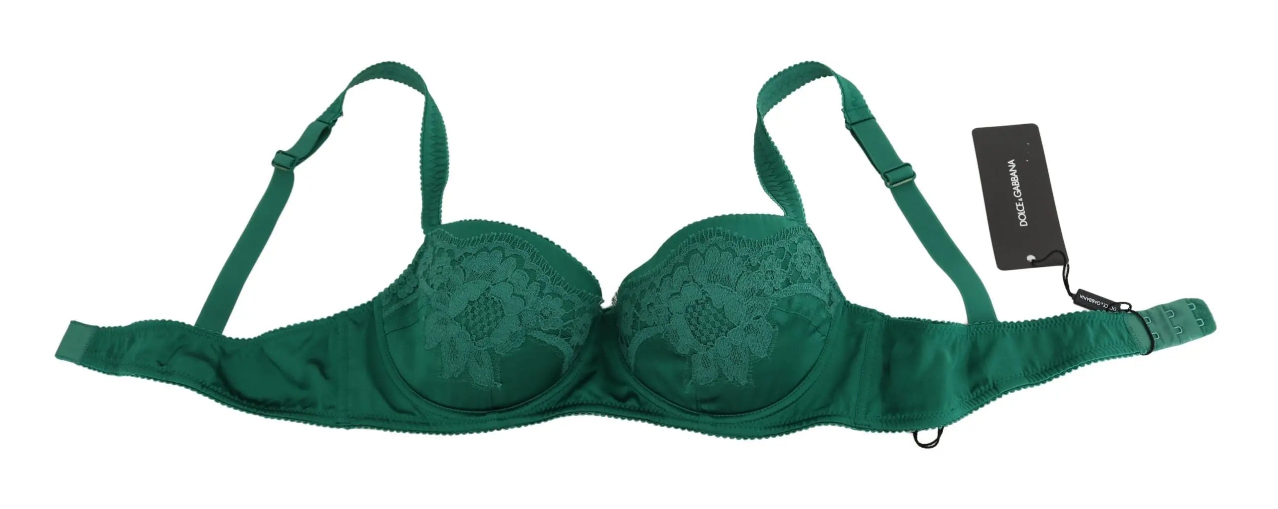 Green silk stretch bra with floral lace detail and adjustable straps on black mannequin torso.